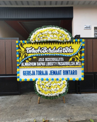 Papan Bunga Duka di Taratara Tiga
